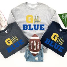 All items are made to order please allow 1-3 business days for production Go Blue Sweatshirt, perfect for tailgates, game day or just snuggling up on the couch   Ideal for any situation, a unisex heavy blend crewneck sweatshirt is pure comfort. These garments are made from polyester and cotton. This combination helps designs come out looking fresh and beautiful. The collar is ribbed knit, so it retains its shape even after washing. There are no itchy side seams on these sweaters.  .: 50% cotton, Michigan Tailgate, Go Blue Michigan, Amy Ward, Michigan College, Michigan Go Blue, Maize And Blue, Michigan Sports, Sports Sweatshirt, Tailgate Outfit