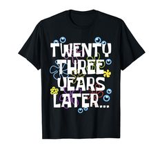 a black t - shirt with the words twenty three years later written in multicolored letters