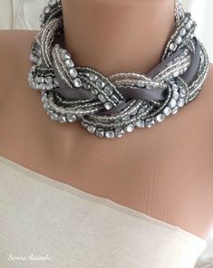 Multi Strand  Braided Silver Gray Choker, Necklace , Street Wear Colar with Satin Ribbon Elevate your street style with this stunning silver-gray choker, designed to add a touch of edgy sophistication to any outfit. Crafted with multiple braided strands, this necklace exudes a modern, bold look perfect for any fashion-forward individual The satin ribbon detail adds a soft, luxurious texture, balancing the sleek silver tones with an elegant finish. This versatile choker is ideal for layering or m Bride Pearl Necklace, Silver Pearl Jewelry, Pearl Bride, Grey Pearl Necklace, Layered Pearl Necklace, Bride Necklace, Bridal Pearl Necklace, Necklaces Silver, Pearl Bridal Jewelry