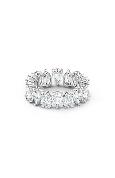 a white gold ring with five diamonds on the side and four rows of stones in each band