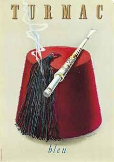 a red hat with tassels and a syringe on top of it