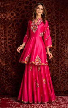 Editor's Note Featuring Hot Pink Peplum & Sharara Set In Dupion Silk Base With Multi-colored Colored Floral Thread Embroidery Which Is Highlighted With Sequins, Dabka And Zardosi. It Is... Floral Thread Embroidery, Embroidered Sharara, Anarkali Dress Pattern, Simple Kurti Designs, Indo Western Dress, Indian Dresses Traditional, Traditional Indian Outfits, Designer Party Wear Dresses