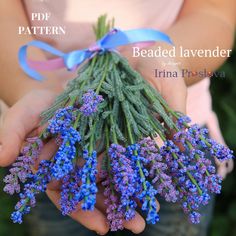 a person holding flowers in their hands with the words beaded lavender written on it