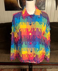 Don't Mess With Texas * Large * Rainbow Colors * Fringe * Jacket. This jacket is in MINT condition with NO tears or stains on the fabric Details:  1.) Size Large  2.) Breast: 42" inches  3.) Waist: 42" inches  4.) Hip: 42" in.  5.) Shoulder to shoulder: 17" in.  6.) Shoulder to hem: 23" in.  7.) Sleeve length: 30" in.  8.) 100% Cotton 9.) Dry Clean  10.) 5 buttons for closure  11.) Made in India  12.) No shoulder pads & No pockets  Thanks for looking Multicolor Cotton Blazer For Fall, Multicolor Cotton Button-up Outerwear, Winter Multicolor Cotton Blazer, Rainbowcore Fashion, Sheer Gloves, Clown Clothes, Diy Clothes Design, Witch Fashion, Fringe Jacket