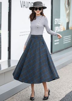 "This plaid wool skirt is a classic piece of tailoring that will see you through rain or shine. It is cut with a flattering flared skirt to give you a wonderful shape. The winter skirt is perfect classic styling. This is a versatile skirt that you'll wear again and again. DETAIL * 30% wool, 30% fiber, 40% polyester * Fully satiny liner * Two side pockets * Right zip closure * Back elastic waist * Elastic band at the back to provide some stretch * A-Line wool skirt * Plus size full skirt * Long w Winter Blue Skirt With Pockets, Blue Midi Skirt For Winter, Gray Lined Skirt For Winter, Plaid Skirt With Pockets For Winter, Gray Full Skirt For Winter, Skirt Outfits Indian, Skirt Outfits Black Women, Korean Skirt Outfits, Skirt Outfits Hijab