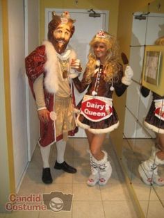 two people dressed in costumes are standing next to each other and posing for the camera