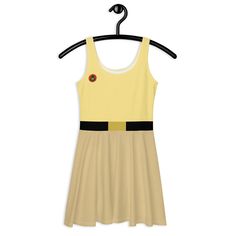 We're ready for adventure with this super cute scout dress that evokes Russel with khaki bottom, yellow top, and belt. This super comfortable running dress will look great during any race. Designed for Spring Suprise 2024, all you need to do is add an orange scarf and sash. We also have the scout uniform dress with the sash!  Easy to wear, and comfortable to run in, this tank dress is perfect for race costumes or every day wear. I am 5'2" and 170 pounds and a large was quite comfortable, but I could have easily worn a medium for Wine & Dine. For Princess, I wore a medium dress and it fit perfectly. * Good stretch for comfortable fit * Mid-thigh length--looks great with or without crinoline * Moisture wicking Due to the nature of printing and sewing the pieces together, the corner of the sa Race Costume, Running Dress, Scout Uniform, Orange Scarf, Uniform Dress, Athletic Gear, Medium Dress, Yellow Top, Good Stretches