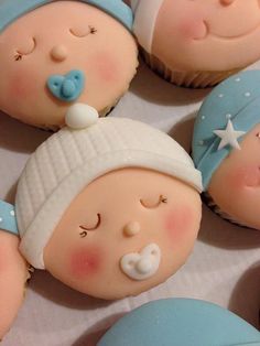 some cupcakes that are shaped like babies