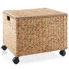 a wicker storage box on wheels is shown