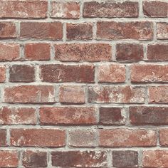 an old brick wall is shown in this image