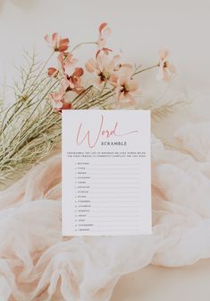 a pink and white wedding game with flowers