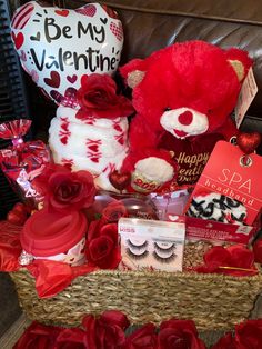 a valentine's day gift basket with a teddy bear