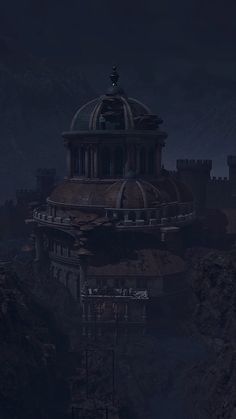 an old building on top of a hill at night