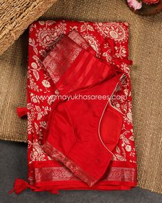 Discover the timeless charm of our Red Munga Silk Saree adorned with intricate Paisley Prints. This exquisite creation showcases a rich red hue on luxurious Munga silk, exuding elegance and grace. The Kanchipuram-inspired gap borders add a touch of tradition and sophistication to this ensemble. What sets this saree apart is the included stitched blouse, available in sizes 38-44, ensuring a perfect fit for your special occasion. At Mayukha Saree Boutique, we are committed to offering a seamless shopping experience, which is why we provide free shipping throughout the USA. Elevate your style with the Red Munga Silk Saree featuring Paisley Prints. Perfect for a variety of occasions, this saree exudes a sense of classic beauty that's sure to make a lasting impression. Embrace the charm and gra Luxury Red Tussar Silk Blouse Piece, Luxury Red Saree With Printed Border, Luxury Red Sets With Printed Border, Luxury Red Tussar Silk Sets, Munga Silk Saree, Saree Boutique, Saree Drapes, Blouse Designed, Pink Canvas