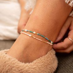 CINTA PEARL BEADED SURF ANKLET Say hello to your new favourite anklet: the Giada Cinta Pearl Beaded Surf Anklet. Designed by Giada Legati, this delicate piece combines natural freshwater pearls, shimmering troca shell beads, and colourful seed beads on a durable wax polyester cord. It's perfect for transitioning from the beach to wherever your day takes you, letting you carry a piece of the ocean's beauty with you always. - Made with natural freshwater pearls, shimmering troca shell beads, colou Surf Jewelry, Beaded Ankle Bracelets, Anklet Designs, Beaded Ankle, Summer Anklets, Pearl Anklet, Thoughtful Gifts For Her, Anklets Boho, Jewelry Summer