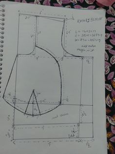 a drawing of a toilet seat on top of a floral print table cloth with instructions to make it