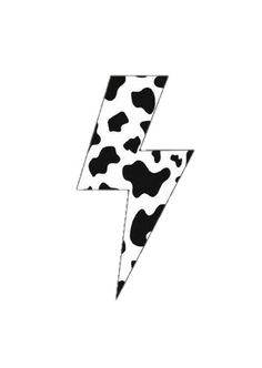 a black and white cow print lightning bolt