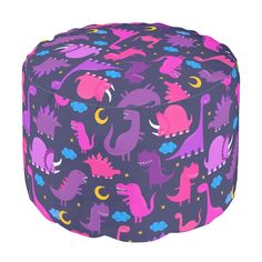 a purple and pink dinosaur print poufce on a white background