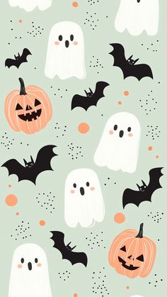 a green background with white ghost and black bats on it's face, surrounded by orange pumpkins