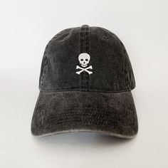 100 % Cotton. One size fits most with an adjustable buckle strap closure. Adult / Unisex Thick ,Soft , and light material. Very nice quality built hats with quality embroidery work. Halloween Hat, Cross Bones, Pink Beanies, Halloween Hats, Embroidered Hat, Dad Cap, Embroidered Hats, Dad Caps, Costume Hats