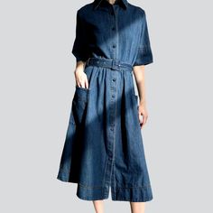 Be the envy of the town with our 2023 Summer Collection's Loose Medium-Wash Jean Dress! This 90s-flair denim piece marries timeless elegance and fashion fashion. combining a elongated silhouette. short sleeves. buttons & belt closure. and a medium-wash for an irresistible look.Why You'll Fall In LoveThis dress is a piece of art in itself! Its baggy shape and medium-wash fabric offer an effortless and informal fit. while its sophisticated brief sleeves and buttons & belt closure add a unique touc Chic Washed Blue Denim Dress, Fitted Belted Denim Dress For Fall, Elegant Long Sleeve Denim Dress For Spring, Fall Relaxed Fit Denim Blue Denim Dress, Denim Midi Dress With Pockets And Short Sleeves, Spring Short Sleeve Belted Denim Dress, Medium Wash Denim Midi Dress With Short Sleeves, Dark Wash Button Closure Summer Dress, Denim Blue Short Sleeve Midi Dress