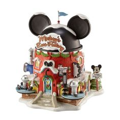 mickey mouse's birthday cake house is shown with its ears on top and the name mickey