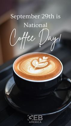 a cup of coffee sitting on top of a saucer with the words national coffee day