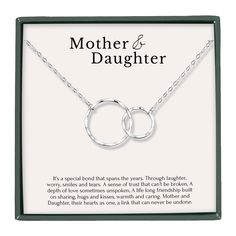 PRICES MAY VARY. MOTHER DAUGHTER BOND: Celebrating the unbreakable bond between a mother and her daughter and make every moment memorable with this heartfelt symbol of love and affection. Our interlocking circles symbolize eternal connection and enduring love. Whether it's to mark a new milestone in motherhood, a gift from daughter to mom, a gift from mom to daughter, a gift to a mom friend -- this necklace is the right choice! GIFT FOR ALL OCCASIONS: Honor the special woman in your life! Our ci Mother Daughter Bond, Double Circle Necklace, Mother Daughter Bonding, Interlocking Circle Necklace, Circles Necklace, Birthday Presents For Mom, Mom Friend, Touch Love, Mother Daughter Necklace