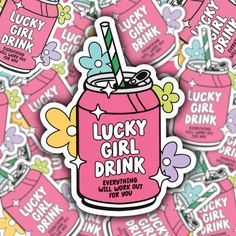 the lucky girl drink sticker is surrounded by pink and yellow stickers