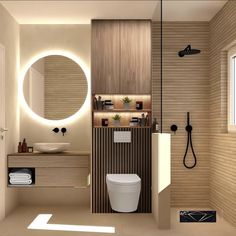 a bathroom with a round mirror above the toilet and sink, along with a shower head