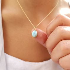 "LARIMAR-NECKLACE                                                          () 100 % Natural, No dye or Coloring () The necklace is very elegant and has the perfect size for daily wear, it is a perfect gift for yourself and your loved ones. Larimar Necklace is completely natural and hand made. The back of the pendat is open so that the stone touches your skin. After your order, we choose the most beautiful stone for you and produce it specifically for you in the color and length you want.    Meterial : High Quality 925 Sterling Silver -Gold Plated -Rose Gold Plated -14K Solid Real Gold  Stone size  : 8x10 mm Oval Shape  Cutting Type of Stone : Cabochon                                           WHAT IS THE LARIMAR STONE GOOD FOR ?                        Larimar is best known to be a healing Spiritual Aquamarine Necklace For Gift, Aquamarine Gemstone Necklace For Gifts, Oval Amazonite Jewelry As Gift, Oval Amazonite Jewelry Gift, Oval Amazonite Jewelry For Gift, Larimar Gemstone Pendant Necklaces, Larimar Gemstone Pendant Necklace, Aquamarine Cabochon Jewelry Gift, Turquoise Aquamarine Necklace For Gift