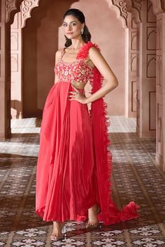 Coral gown with multi colored floral embroidered bodice, front pleats, side to back cutouts and attached ruffled draped trail. - Aza Fashions Coral Gown, Draped Gown, Drape Gowns, Embroidered Bodice, Ladies Gown, Gowns Online, Aza Fashion, Multi Colored, Bodice