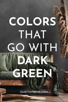 a couch with the words colors that go with dark green in front of it and a plant