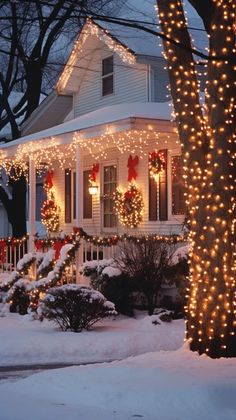 a house with christmas lights on the front porch