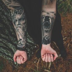 two people with tattoos on their arms and hands, one is holding the other's hand