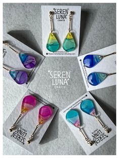 four pairs of colorful sunglasses on display in front of an ad for screen lunaa