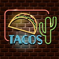 tacos neon sign on brick wall background