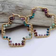 Swiss Cross Gold Hoop Earrings Wire Wrapped With A Rainbow Array Of Earth-Toned Tiny 2-3mm Genuine Semi-Precious Gemstones. Only The Best Gemstones Were Used In Making These Wire Wrapped Beauties. They Are All Genuine, Many Are Of Aaa Quality: Turquoise Citrine Phosphosiderite Garnet Amazonite Green Turquoise Gold Plated Crosses One Of A Kind Hand Crafted By Me Diy Earrings Packaging, Earrings Packaging, Crystal Statement Earrings, Clear Crystal Earrings, Large Silver Hoop Earrings, Swiss Cross, Cross Gold, Wire Jewelry Designs, Earrings Wire