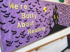 there is a batty about reading sign on the wall