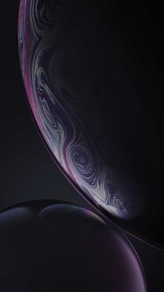 the back side of an iphone xr with purple swirls on it's screen