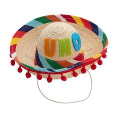 a hat with the word uno written on it and pom - poms around the brim