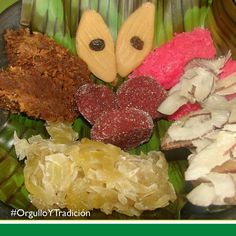 a plate filled with different types of food on top of a green cloth covered table