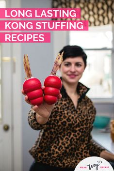 a woman is holding up some food in her hand with the caption long lasting kong stuffing recipes