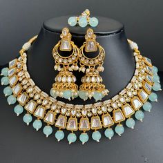 Aqua Blue Pearl Kundan Necklace, Kundan jewelry, Indian Pakistani Wedding Jewelry Kundan Necklace Set/Bollywood Jewelry/Indian wedding set/Bridal necklace set/Pakistani jewelry/wedding kundan set /Punjabi Jewelry Ships from California, USA USA delivery is in 3-5 days. This is 100% Handmade jewelry. So Color, shades, and texture displayed may slightly vary from the actual product due to digital image limitations. We request you consider these minor variations. Please expect the possibility of som Blue Hand-set Kundan Necklace For Weddings, Blue Hand Set Kundan Necklace For Wedding, Blue Bollywood Bridal Necklace For Wedding, Blue Kundan Necklace For Diwali Wedding, Blue Kundan Necklace For Wedding And Diwali, Blue Chandbali Bridal Necklace For Wedding, Blue Meenakari Bridal Necklace For Wedding, Blue Bollywood Style Jewelry For Wedding, Blue Tilla Bridal Necklace For Wedding