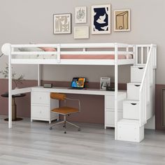 a white loft bed with desk underneath it