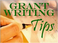 a hand writing on top of a piece of paper with the words grant writing tips