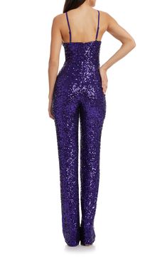 A formal affair gets way more fun when you arrive in this statement jumpsuit bathed in sparkling purple sequins and served with a halter-inspired neckline. 56" length (size Small) V-neck Adjustable straps Partially lined 95% polyester, 5% spandex Hand wash, dry flat Imported Glamorous Fitted Strapless Jumpsuit For Gala, Glamorous Strapless Jumpsuit For Prom, Glamorous Fitted Strapless Jumpsuit For Prom, Glamorous Strapless Jumpsuit For Gala, Fitted Embellished Jumpsuits And Rompers For Gala, Elegant Strapless Jumpsuit With Sequins For Night Out, Elegant Strapless Sequin Jumpsuit For Night Out, Glamorous Evening Jumpsuits And Rompers For Holidays, Cocktail Embellished Fitted Jumpsuits And Rompers