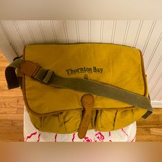 Vintage Nwot Thornton Bay Cross-Body Tan Messenger Bag Foldover - Never Used Casual Yellow Shoulder Bag For Outdoor, Yellow Outdoor Bag With Adjustable Strap, Yellow Bag With Adjustable Strap For Outdoor, Yellow Shoulder Bag For Outdoor, Mustard Travel Bag With Adjustable Strap, Yellow Tote Bag For Outdoor, Vintage Yellow Crossbody Bag, Vintage Yellow Bag For Everyday Use, Vintage Yellow Bag For Everyday