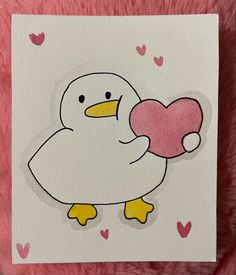 a card with a duck holding a heart