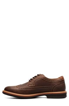 A fully cushioned insole and flexible sole ensure lasting comfort in this polished leather oxford featuring classic brogued detailing. Lace-up style Removable insole Leather upper/textile lining/rubber sole Imported Brown Wingtip Lace-up Oxford Shoes, Business Casual Oxford Lace-up Shoes With Brogue Detailing, Leather Oxfords For Derby, Brown Wingtip Leather Shoes With Cushioned Footbed, Brown Oxfords With Perforated Toe For Business Casual, Masculine Brogue Oxfords Lace-up, Classic Brogue Lace-up Shoes, Masculine Lace-up Oxfords With Brogue Detailing, Classic Lace-up Shoes With Brogue Detailing And Plain Toe